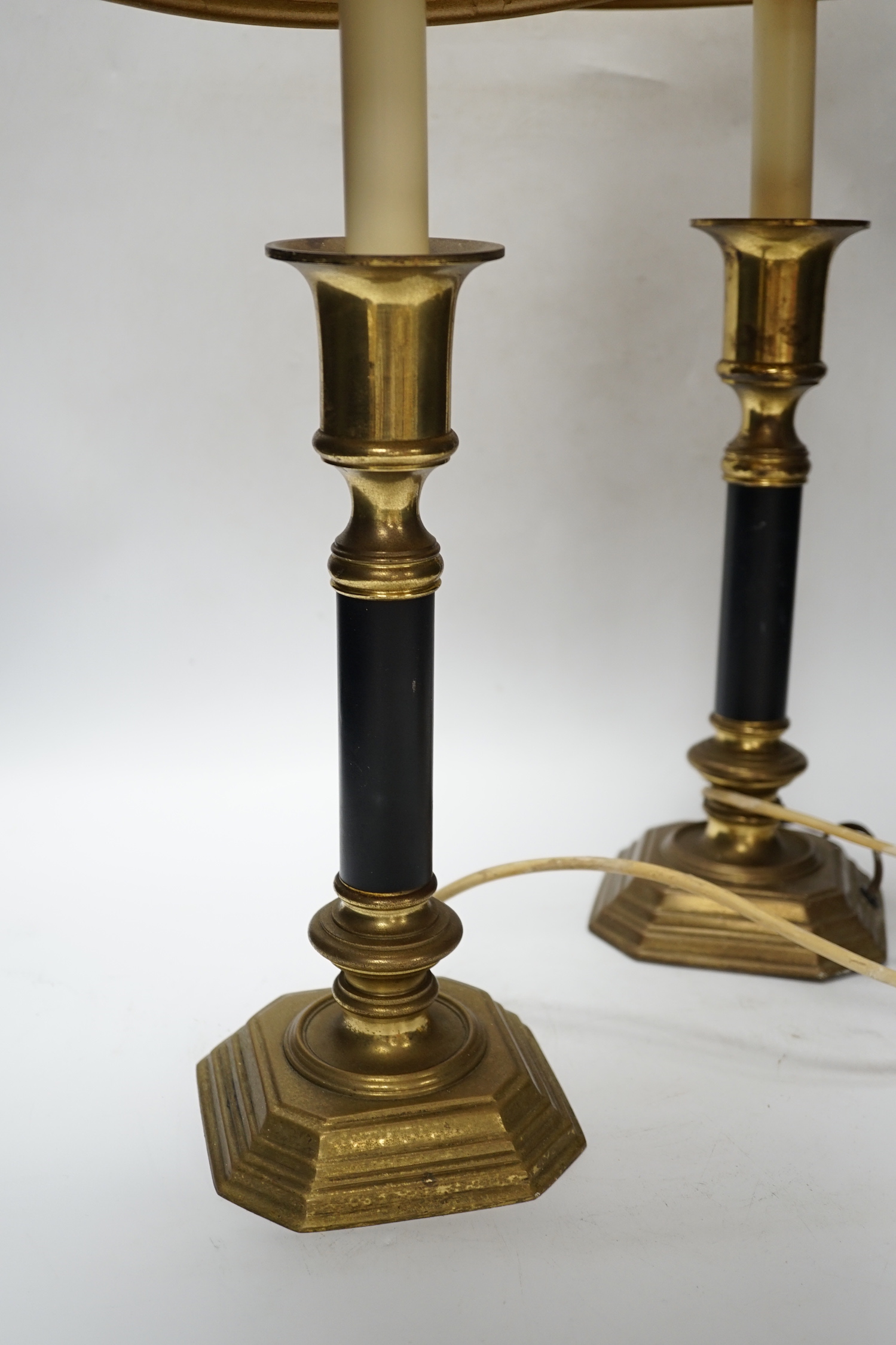 A pair of brass and black table lamps and shades, 64.5cm high